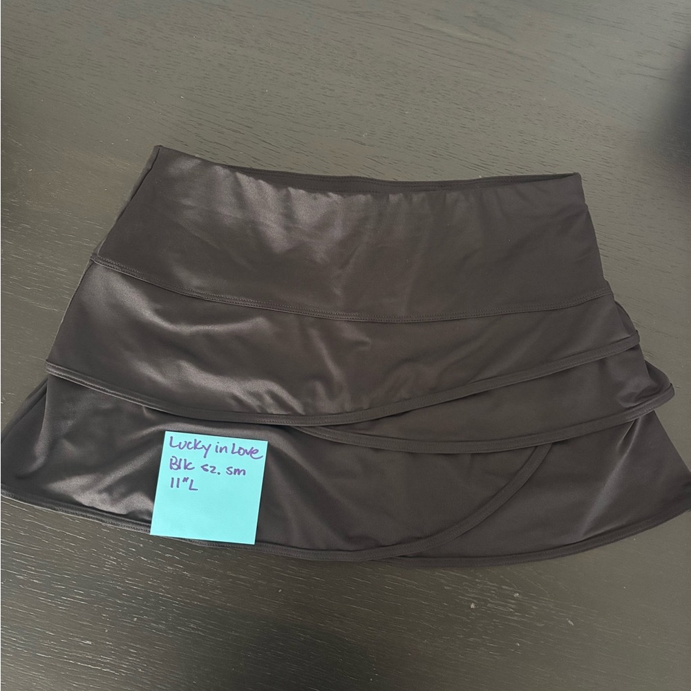 Lucky in love black tennis skirt